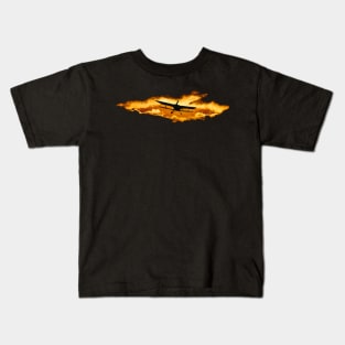 Biplane in the sky with sunset Kids T-Shirt